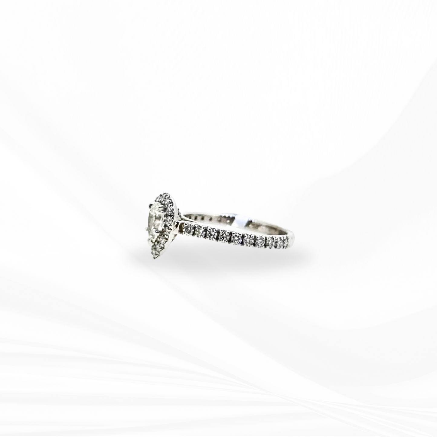 Pear Natural Diamond with a Halo Engagement Ring