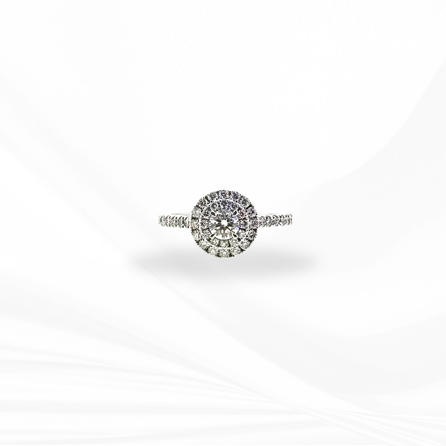 Round Brilliant Cut Natural Diamond with a Double Halo and a Hidden Halo Engagement Ring