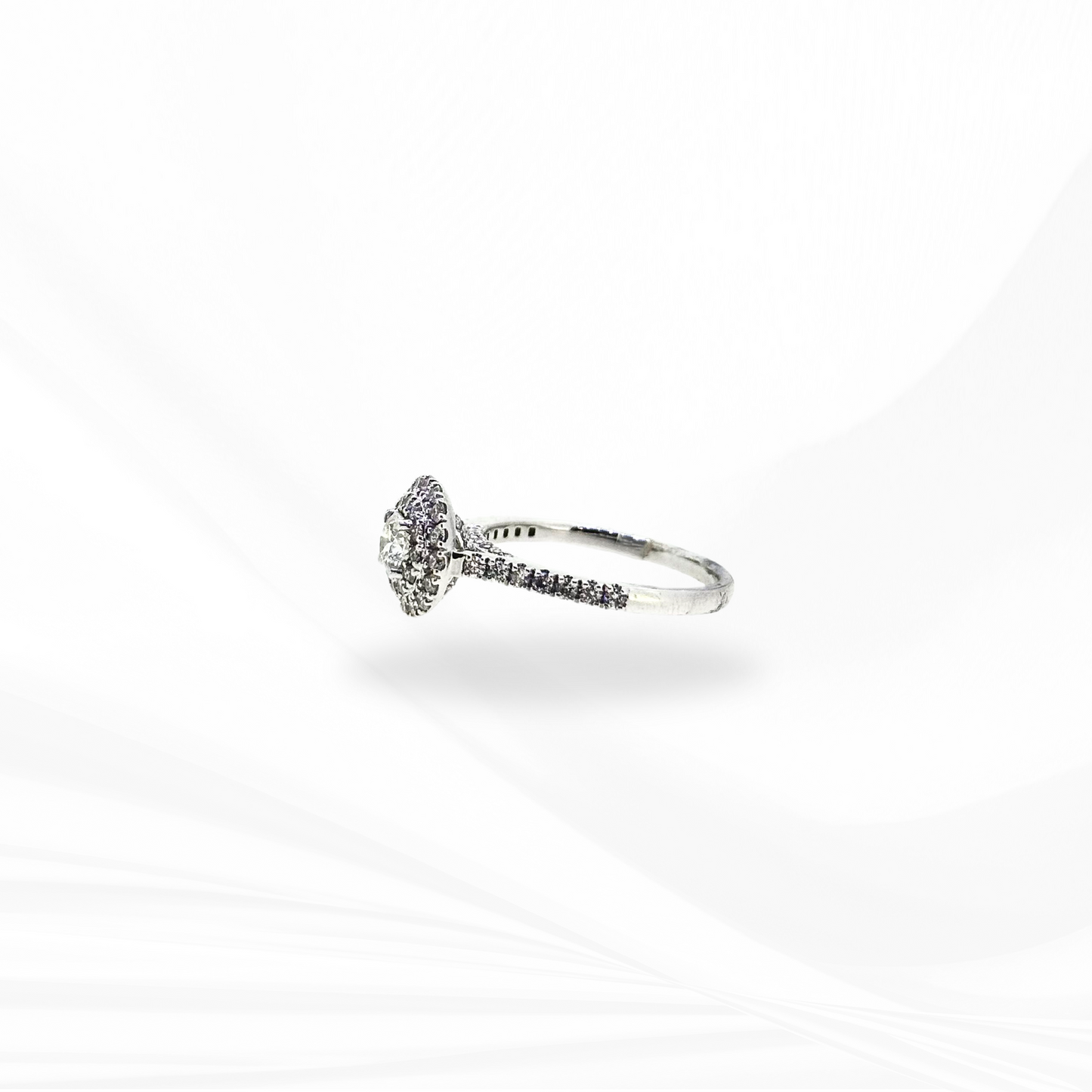 Round Brilliant Cut Natural Diamond with a Double Halo and a Hidden Halo Engagement Ring