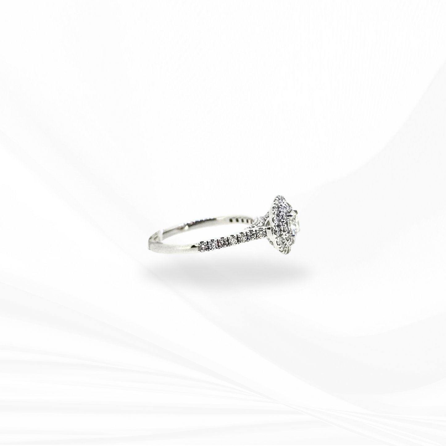 Round Brilliant Cut Natural Diamond with a Double Halo and a Hidden Halo Engagement Ring