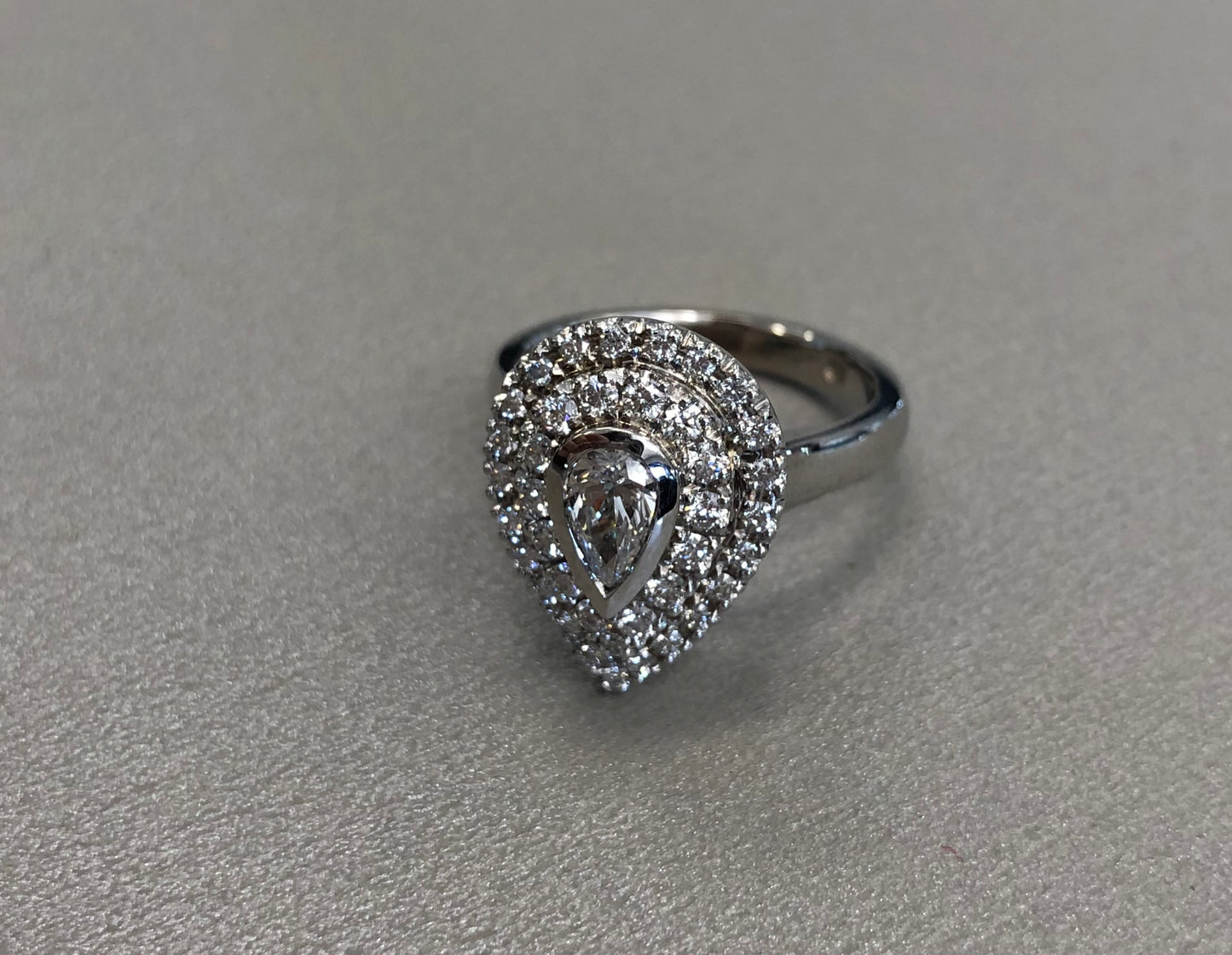 Pear Centerstone Natural Diamond with a Double Halo Engagement Ring