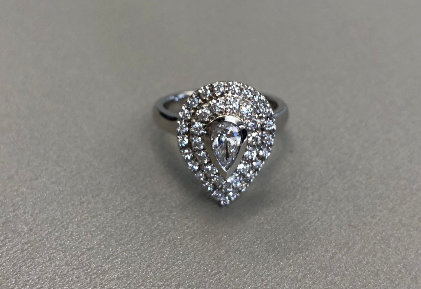 Pear Centerstone Natural Diamond with a Double Halo Engagement Ring