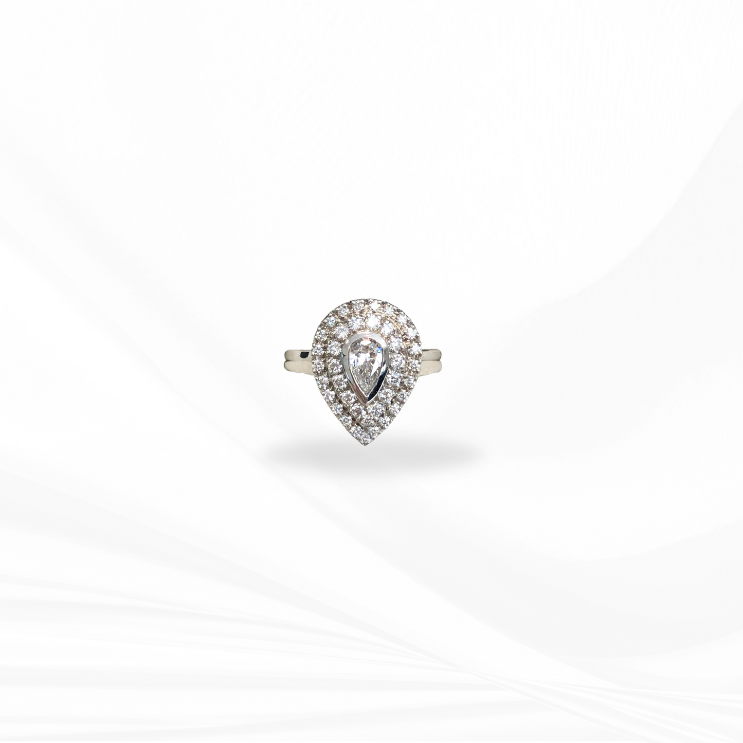 Pear Centerstone Natural Diamond with a Double Halo Engagement Ring