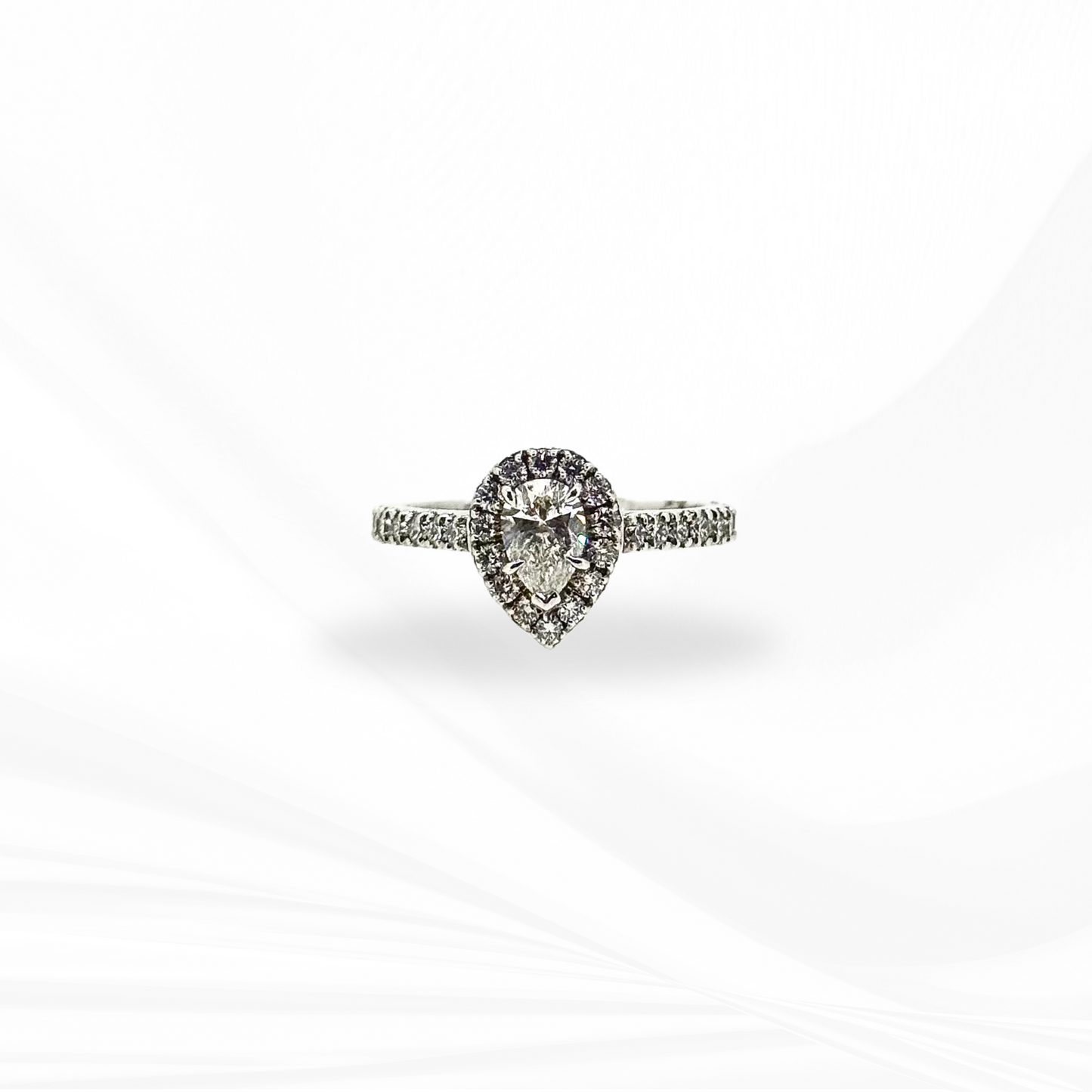 Pear Natural Diamond with a Halo Engagement Ring