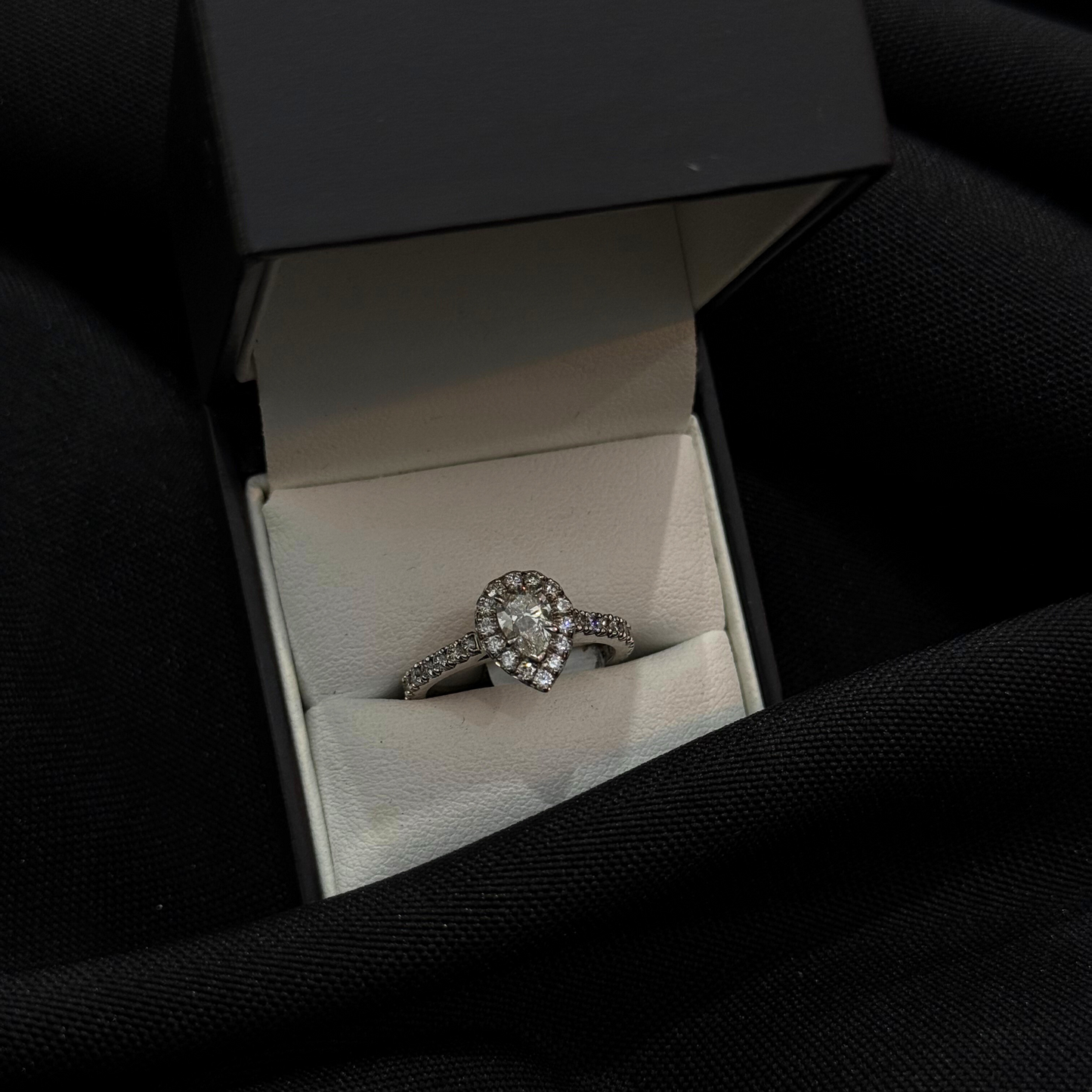 Pear Natural Diamond with a Halo Engagement Ring