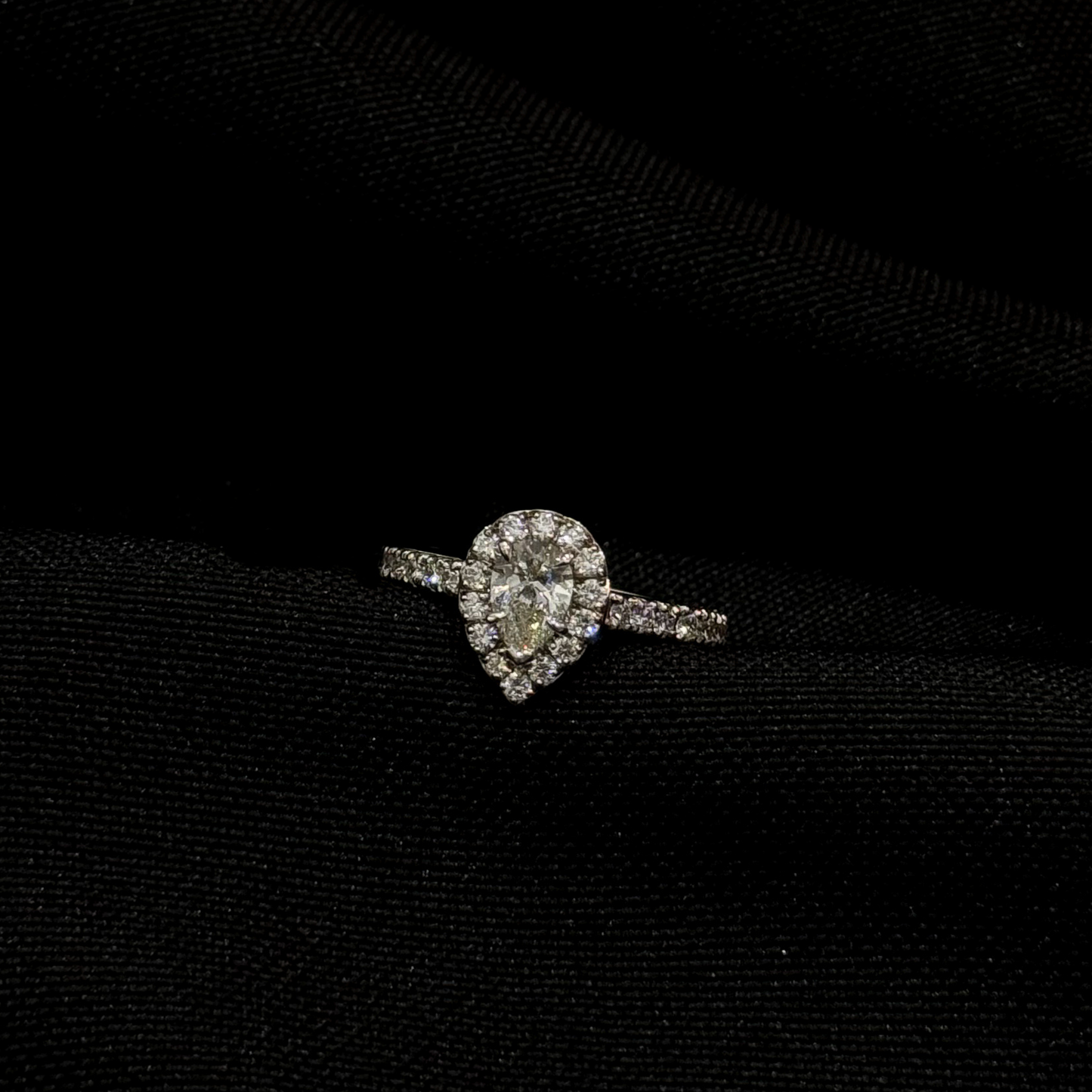 Pear Natural Diamond with a Halo Engagement Ring