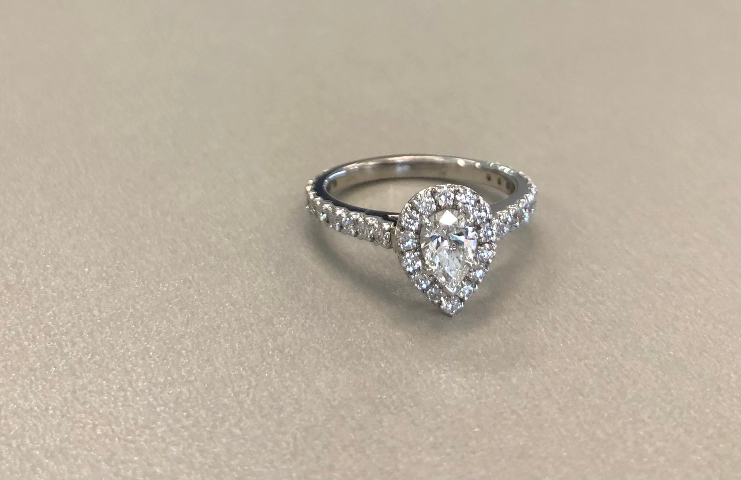 Pear Natural Diamond with a Halo Engagement Ring